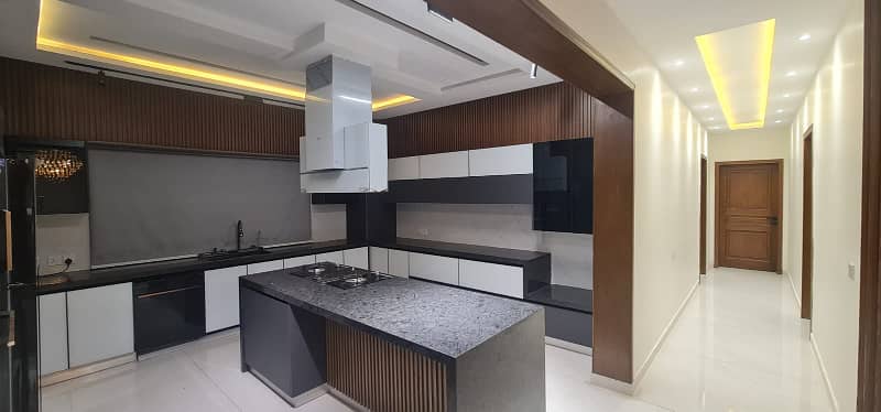 F-11/2: A Brand New Masterpiece of EleganceFully-Furnished 666 Yards Residence, Dimension = 50120, Margalla-Facing, High-End Construction, 9 Luxurious Bedrooms, A Spacious Full Basement. Price: 32.50 Crores. 34