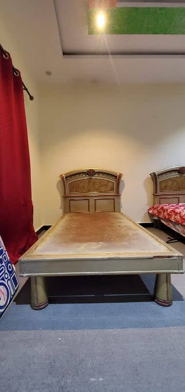 2 single beds without mattress 3
