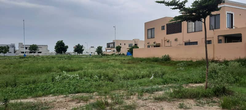 Prime Location! 1 Kanal Residential Plot on 150ft Road in DHA Phase 7 Block W For Sale @ 450 Lac 0