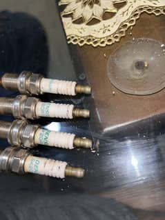 DENSO SK20R11 spark plugs 4 pieces only 2 days used for sale