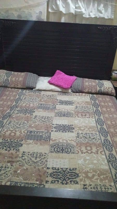 A Bed in new condition with 2 site tables and matris 0