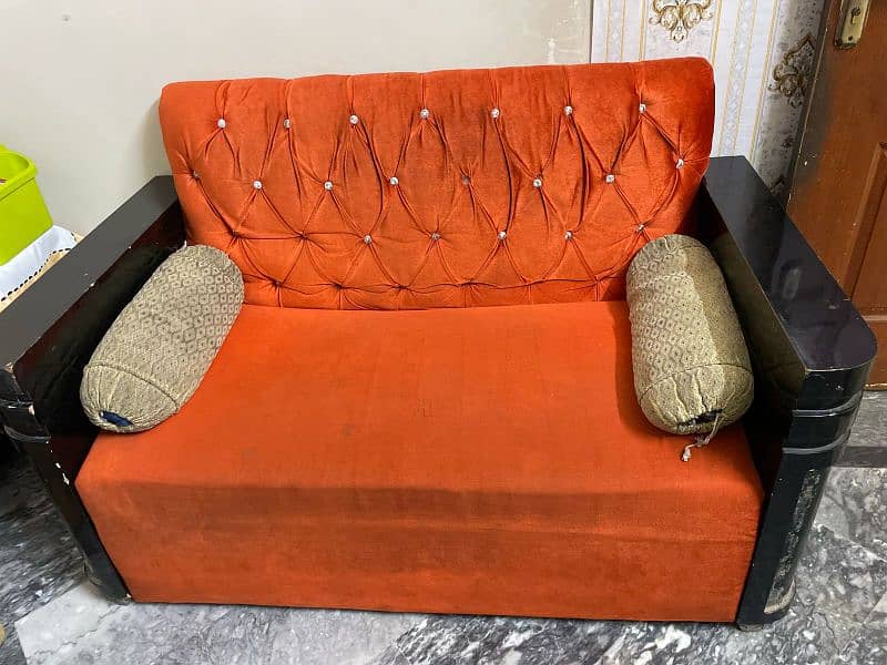 Two seater sofa. . . 1