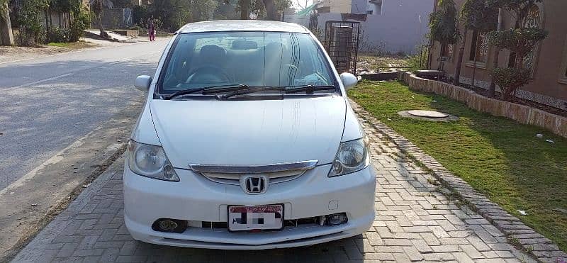 Honda City IDSI 2004 Automatic 17/18 Average in city Long 20/21 2