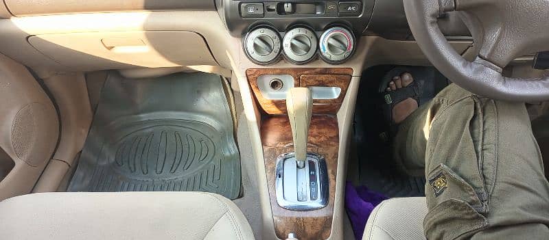 Honda City IDSI 2004 Automatic 17/18 Average in city Long 20/21 4