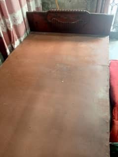 single wooden bed