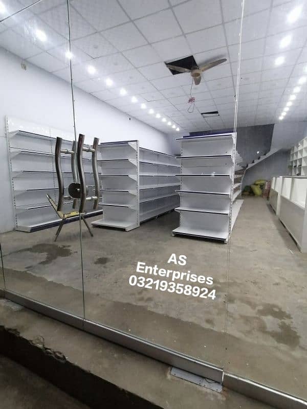 wall racks,center racks,cash counter,shopping trolley,baskits 1