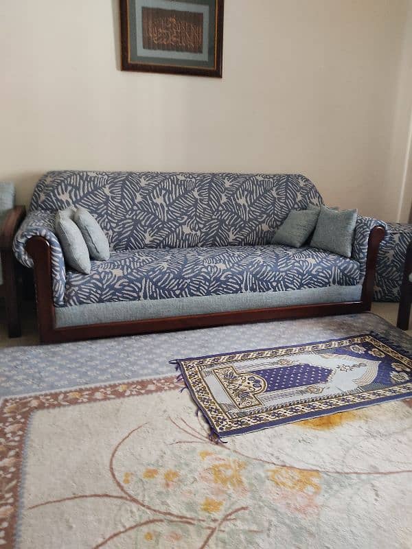 Three seater sofa with extra leg cushion 0