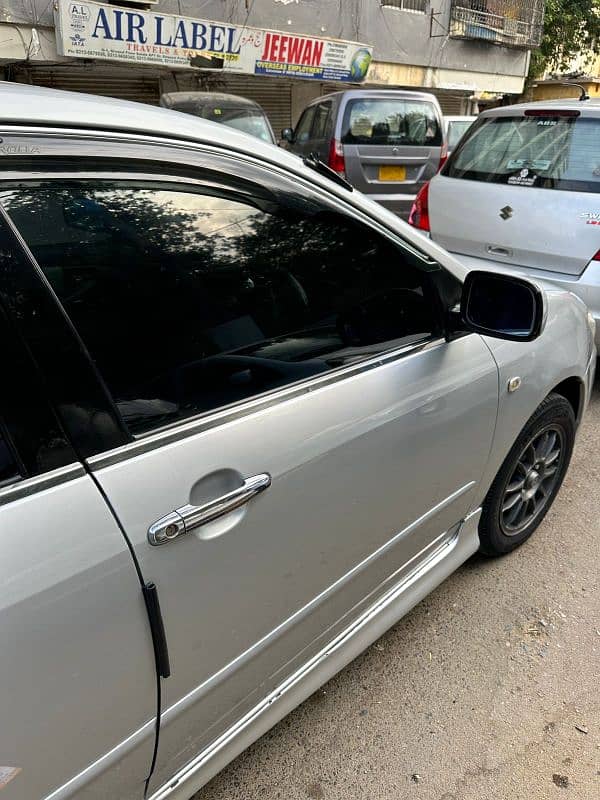 Toyota XCorolla HiD 1. . 5  2006 8