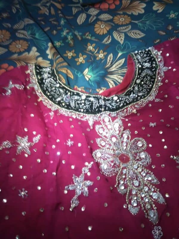 dark pink clor long shirt and lehnga 0