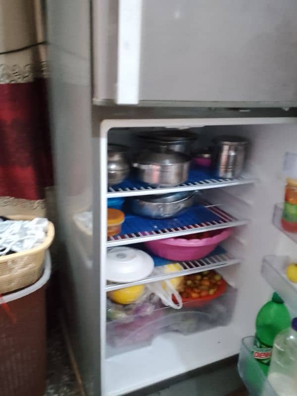 I am sale my dawlance refrigerator in good condition 3