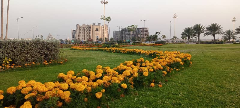 ALI BLOCK Precicnt-12 Near Grand Mosque. Park Face. Corner Category Plot Available FOR SALE 24