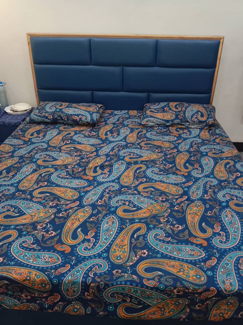 King size navy blue bed with side tables and mattress 1