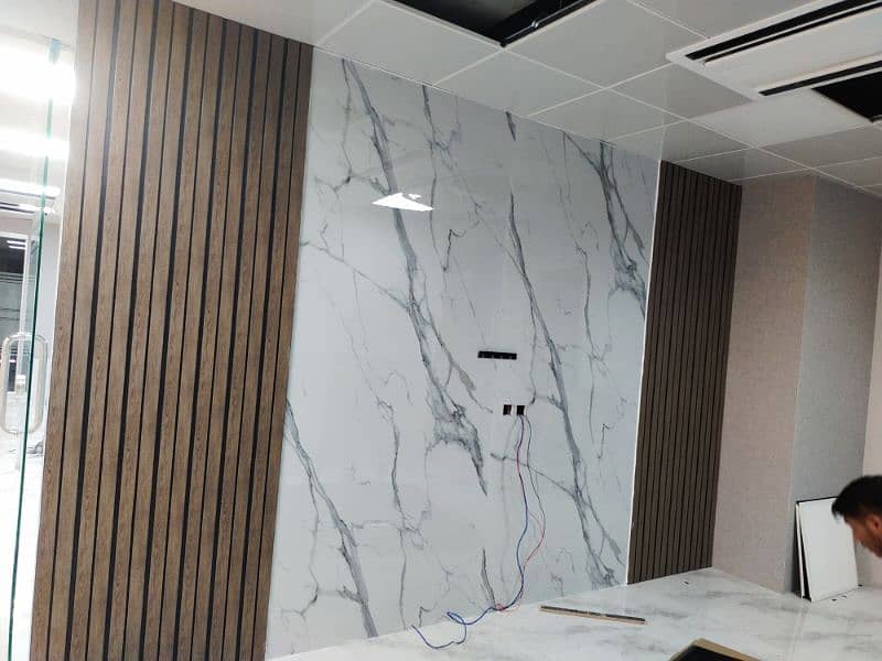 wallpaper wpc wall panelling Gypsum false ceiling available in isb 12