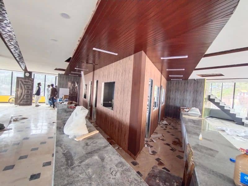 wallpaper wpc wall panelling Gypsum false ceiling available in isb 15