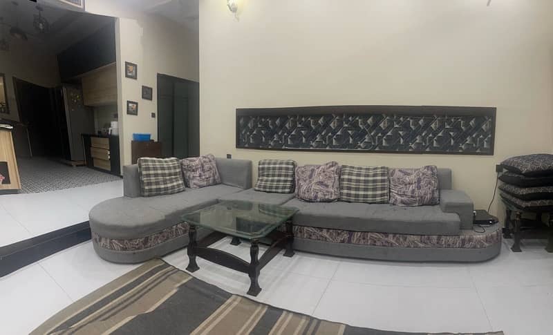 seven seater sofa in grey and blue colour 0