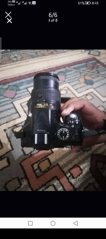 Nikon D5200 with 18-70mm lenz 0