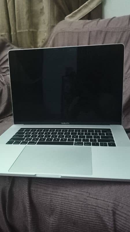 Macbook pro 2019 with original charger (10/10) condition 10