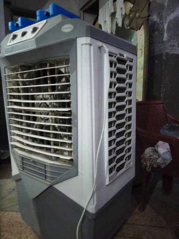 canon air cooler with 4 cool bottles 5