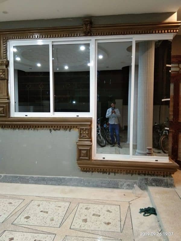 ALUMINIUM WINDOW AND GLASS PARTITION 0