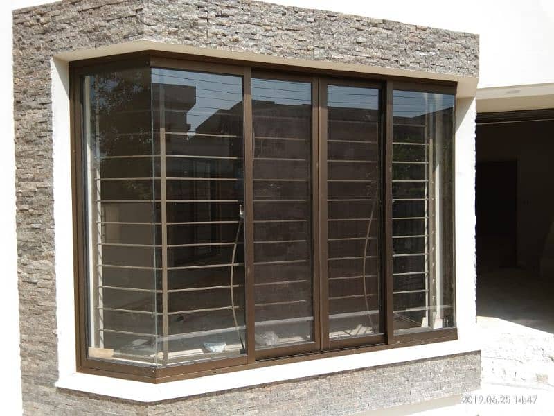 ALUMINIUM WINDOW AND GLASS PARTITION 2