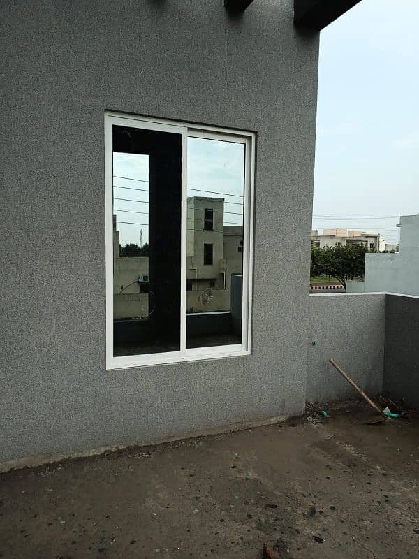 ALUMINIUM WINDOW AND GLASS PARTITION 3