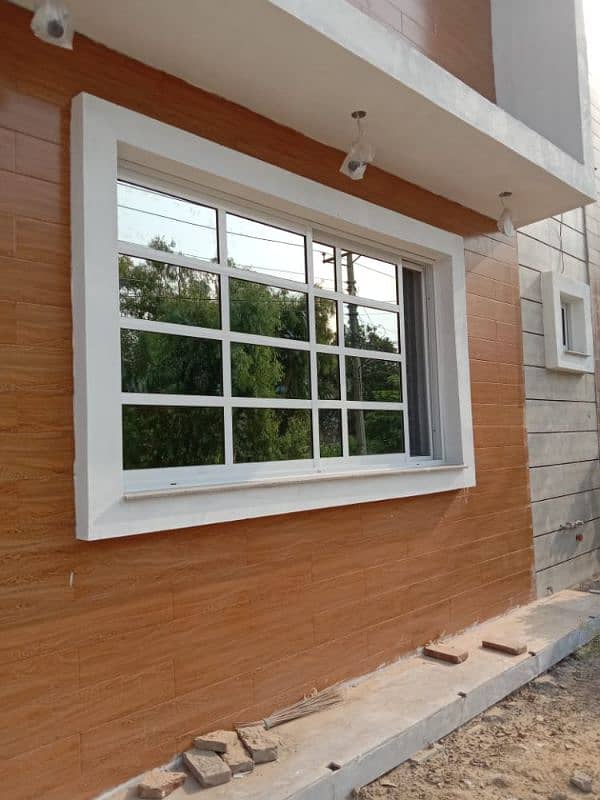 ALUMINIUM WINDOW AND GLASS PARTITION 6