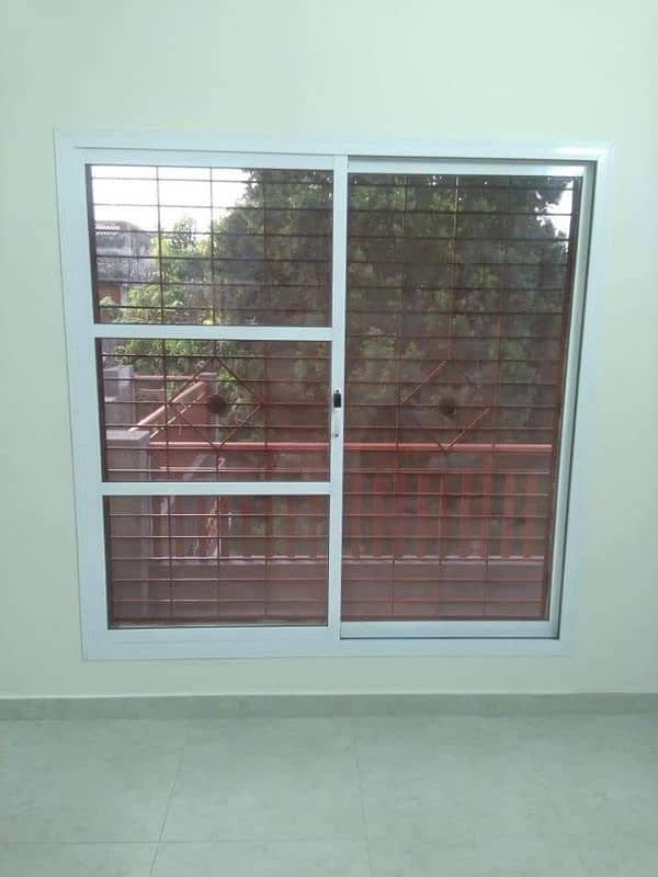 ALUMINIUM WINDOW AND GLASS PARTITION 1
