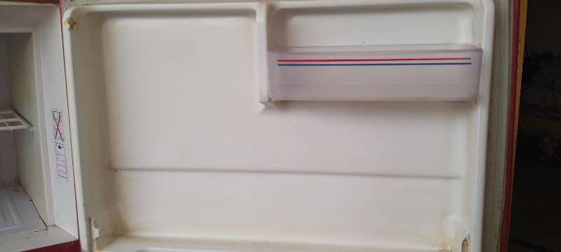 fridge for sale in good condition . 3