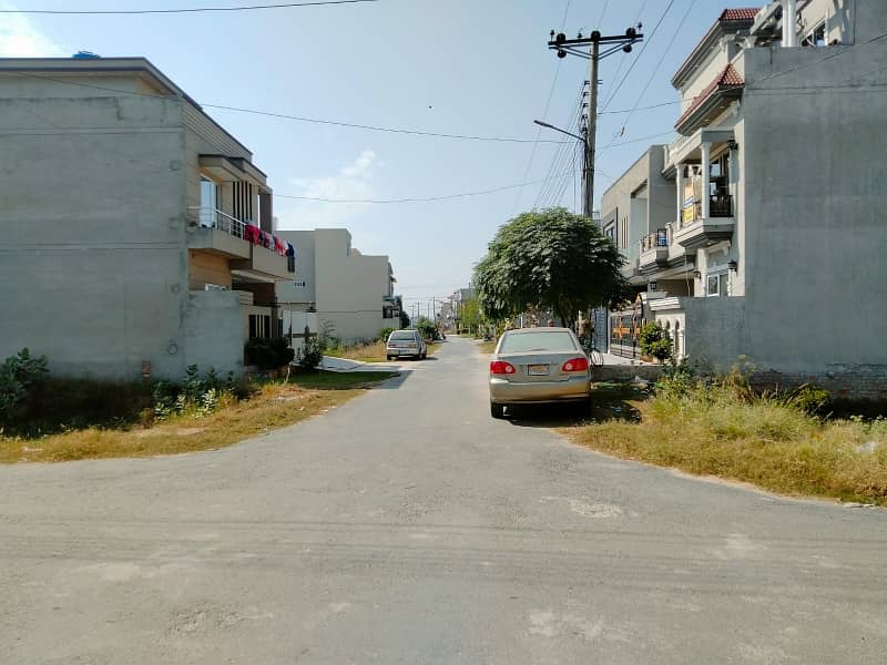 EXCELLENT LOCATION LEVEL PLOT AMONG HOUSES IS FOR SALE 4