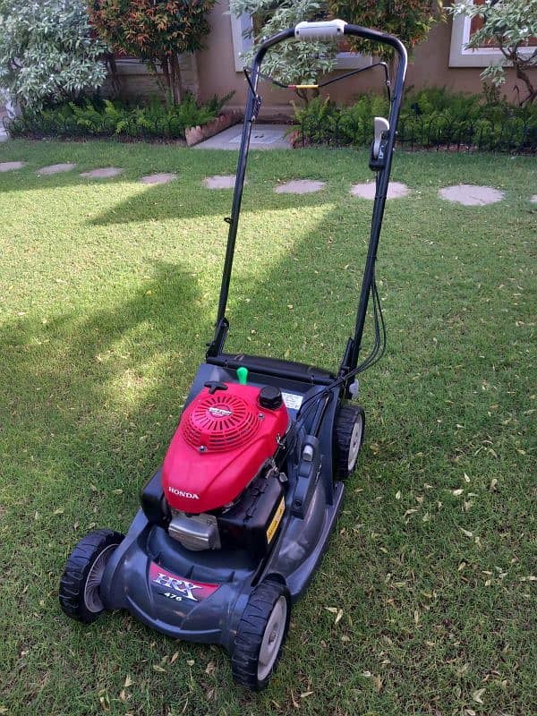 Honda HRX 476 Petrol-Powered Lawn Mover "Grass cutting machine" 9
