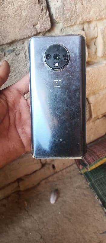 One plus 7t 8/128 single sim official pta original chargr. 03041023675 3