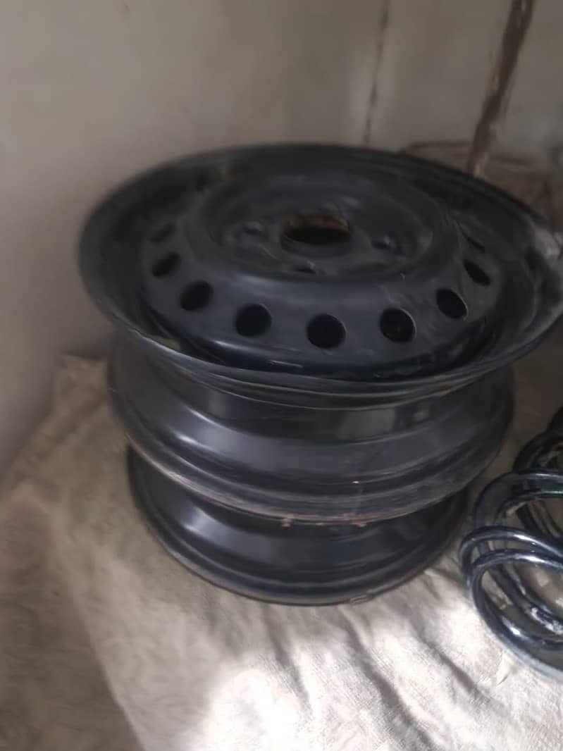 Suzuki Alto Genuine Steel Rims with Caps | 15K KM Driven (Set of 4) 0