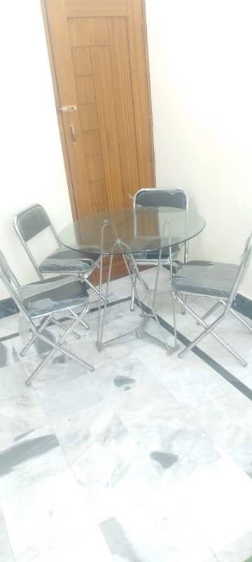 glass table and 4 chairs 0