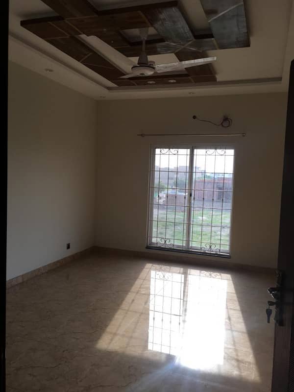 Hot Location, Cool Price 1-Kanal Modern Portion with 3 Luxurious Bedrooms, Front & Back Terraces, and Private Entry in DHA Phase 7 5
