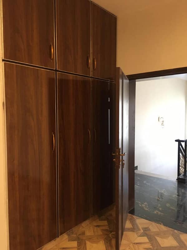 Hot Location, Cool Price 1-Kanal Modern Portion with 3 Luxurious Bedrooms, Front & Back Terraces, and Private Entry in DHA Phase 7 9