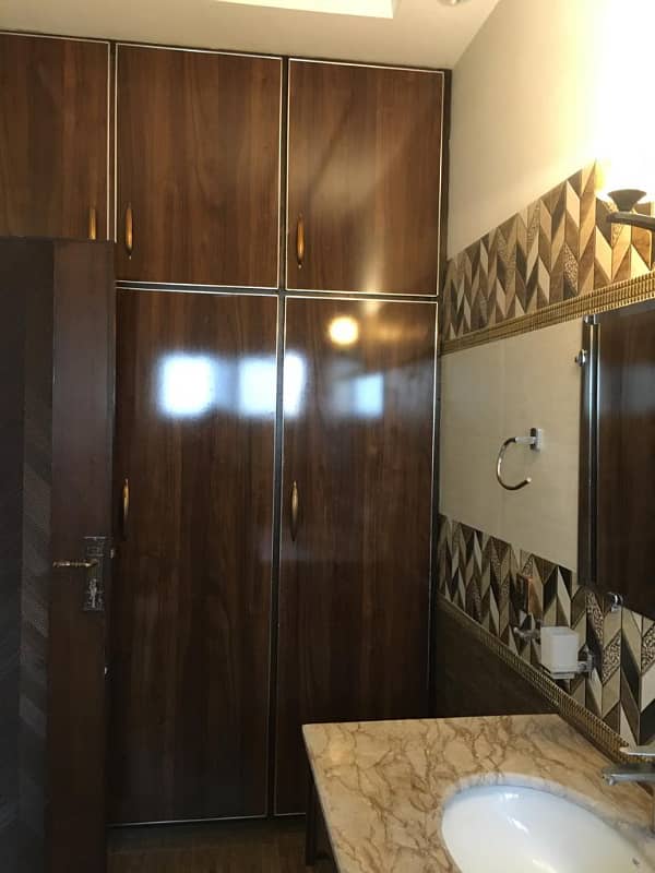 Hot Location, Cool Price 1-Kanal Modern Portion with 3 Luxurious Bedrooms, Front & Back Terraces, and Private Entry in DHA Phase 7 13