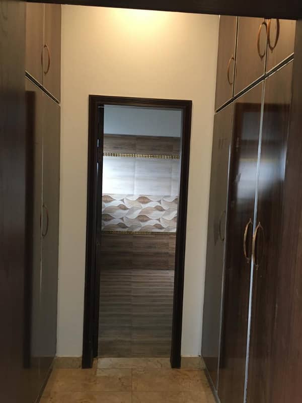 Hot Location, Cool Price 1-Kanal Modern Portion with 3 Luxurious Bedrooms, Front & Back Terraces, and Private Entry in DHA Phase 7 16