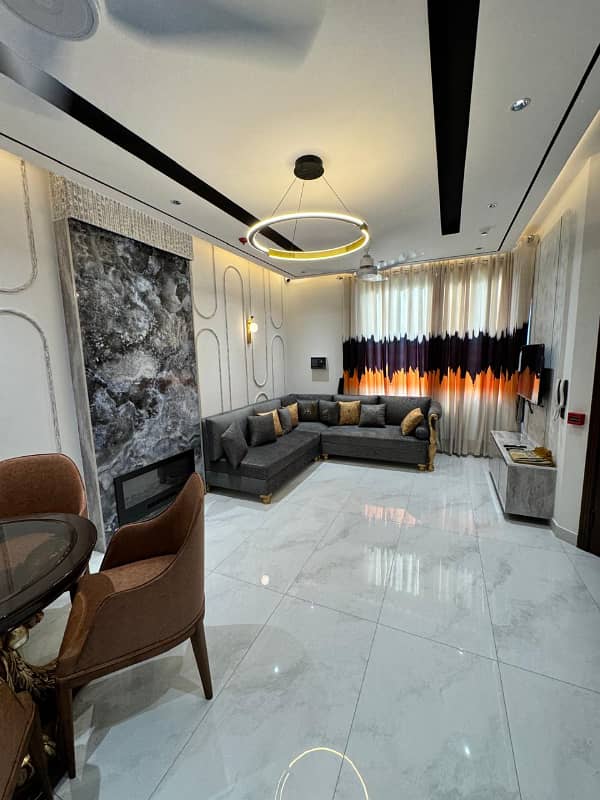 Brand New 5-Marla Fully Furnished Bungalow with 3-Bedrooms, Attached Baths, and Servant Quarters for Rent in DHA Phase 9-Town Ideal Location and Easy Deal with Wall Green Realtors 0