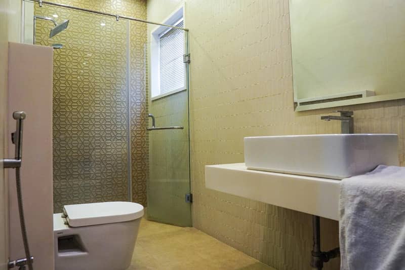 Lower Locked 2-Kanal Ultra-Spacious Upper Portion lower look for Rent 3 Bedrooms, Attached Baths, Drawing, Dining, Kitchen & Prime DHA Phase 3 Location 4