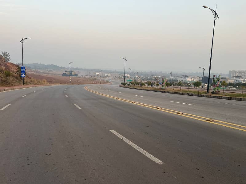 Spacious 10 Marla Plot on Main 120 Ft Road Possession Available 8
