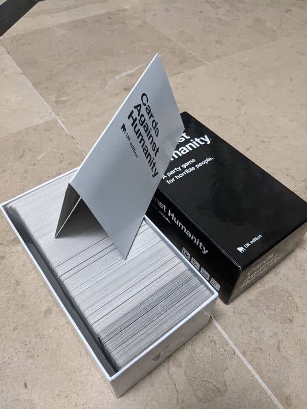 Cards against humanity playing cards game. 6