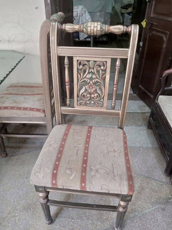 6 seater/chair dinning table with solid glass top 2