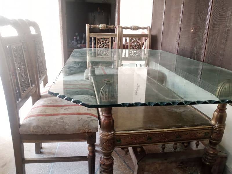 6 seater/chair dinning table with solid glass top 5