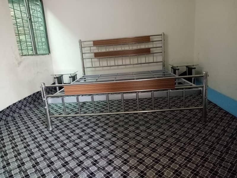 Steel double bed with side tables 0