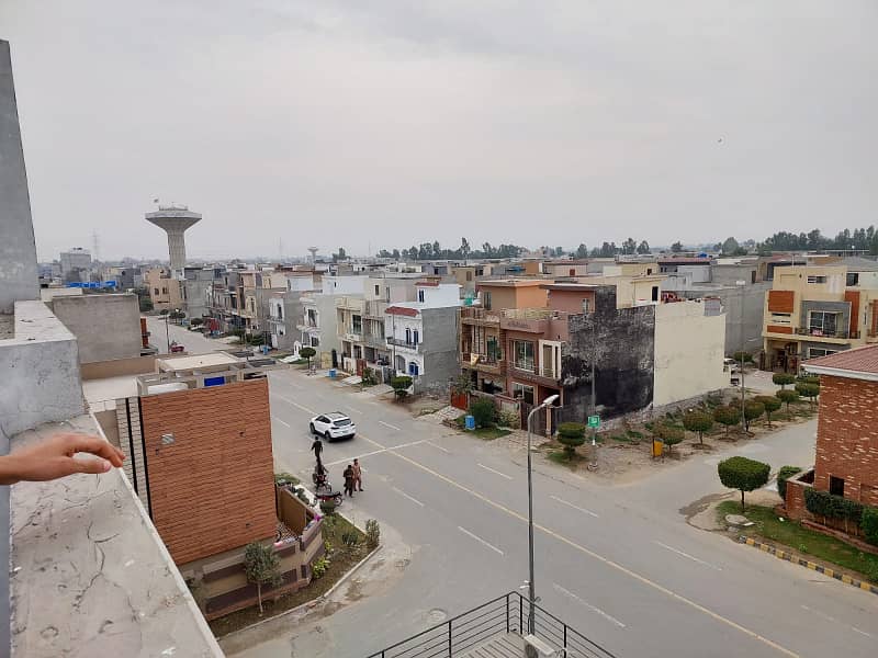 5 MARLA RESIDENTIAL PLOT FOR SALE WITH POSSESION @ MAIN 80 FEET ROAD IN AL KABIR TOWN PHASE 2 BLOCK B 14