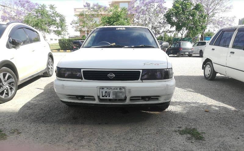 Nissan sunny Ex saloon Genvion condition 1