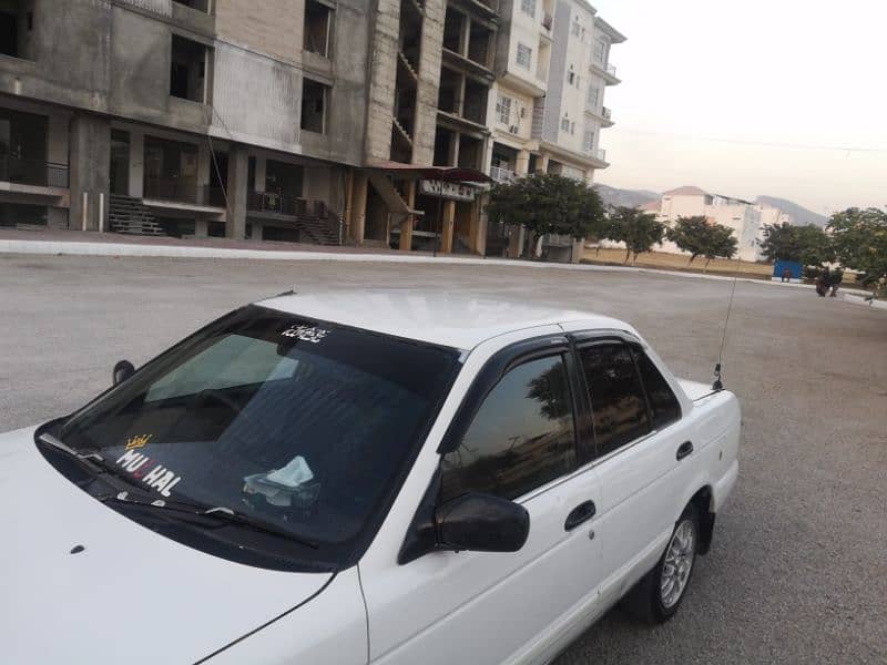 Nissan sunny Ex saloon Genvion condition 2