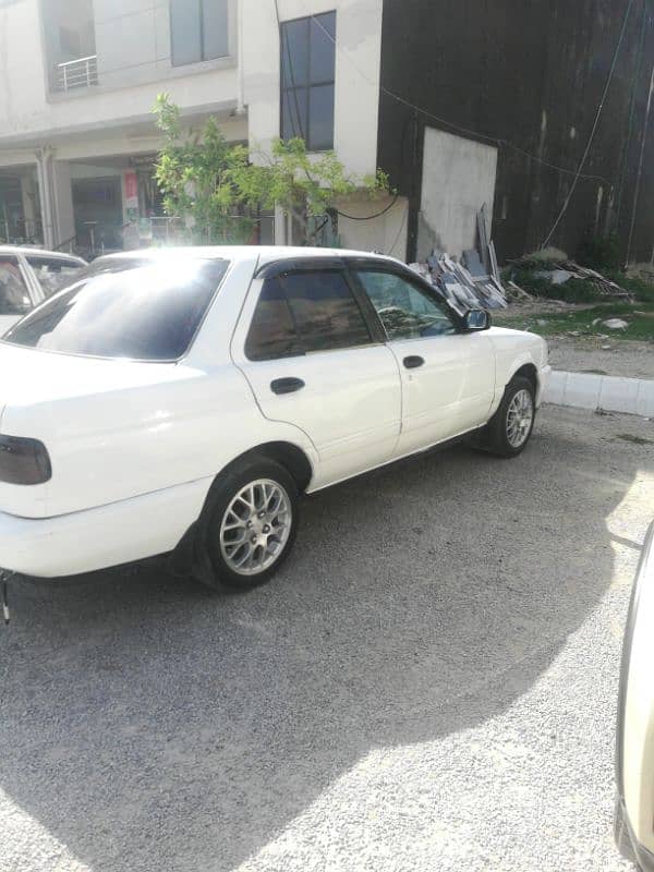 Nissan sunny Ex saloon Genvion condition 8