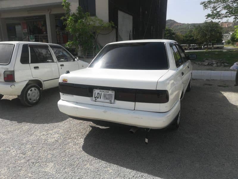Nissan sunny Ex saloon Genvion condition 9