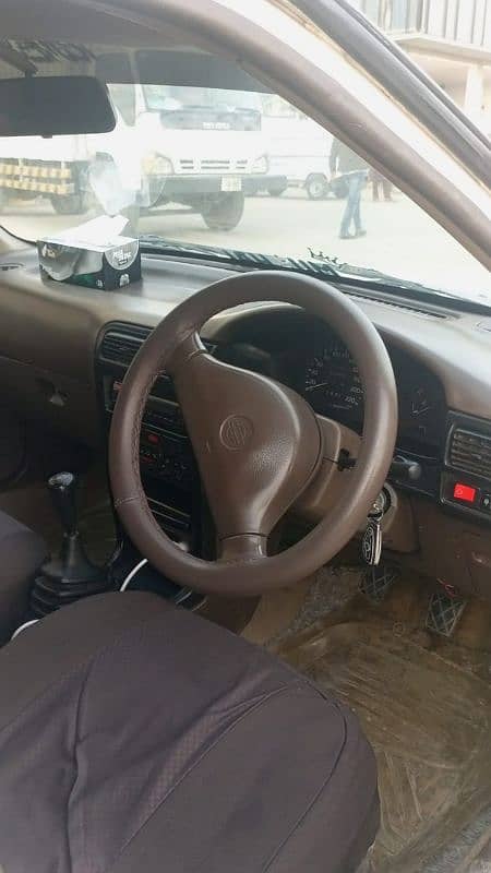 Nissan sunny Ex saloon Genvion condition 12